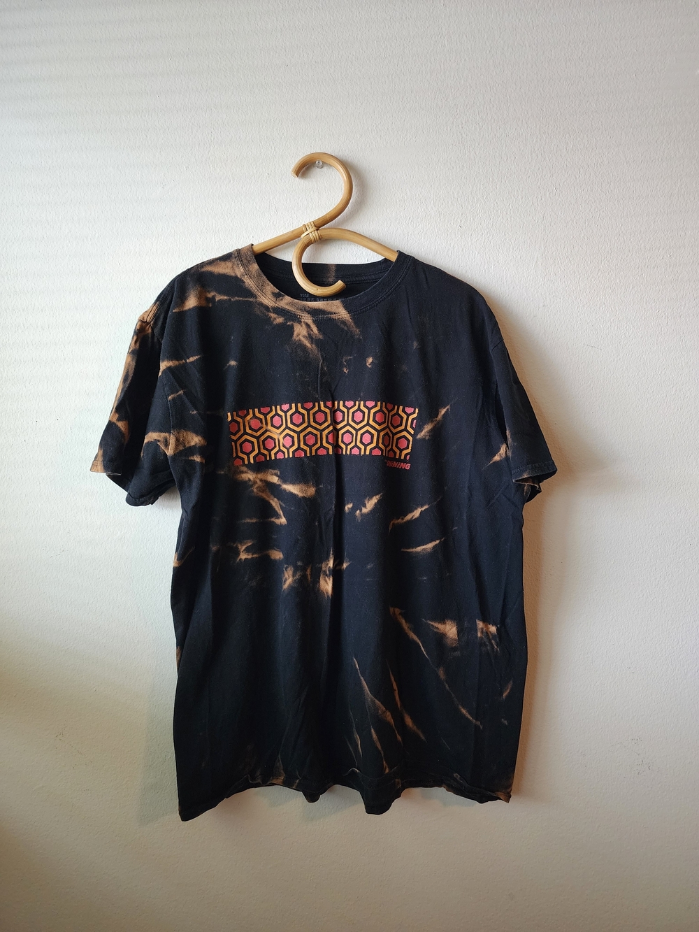Vintage Black Tee with Orange Tie-Dye and Multicolor Geometric Panel